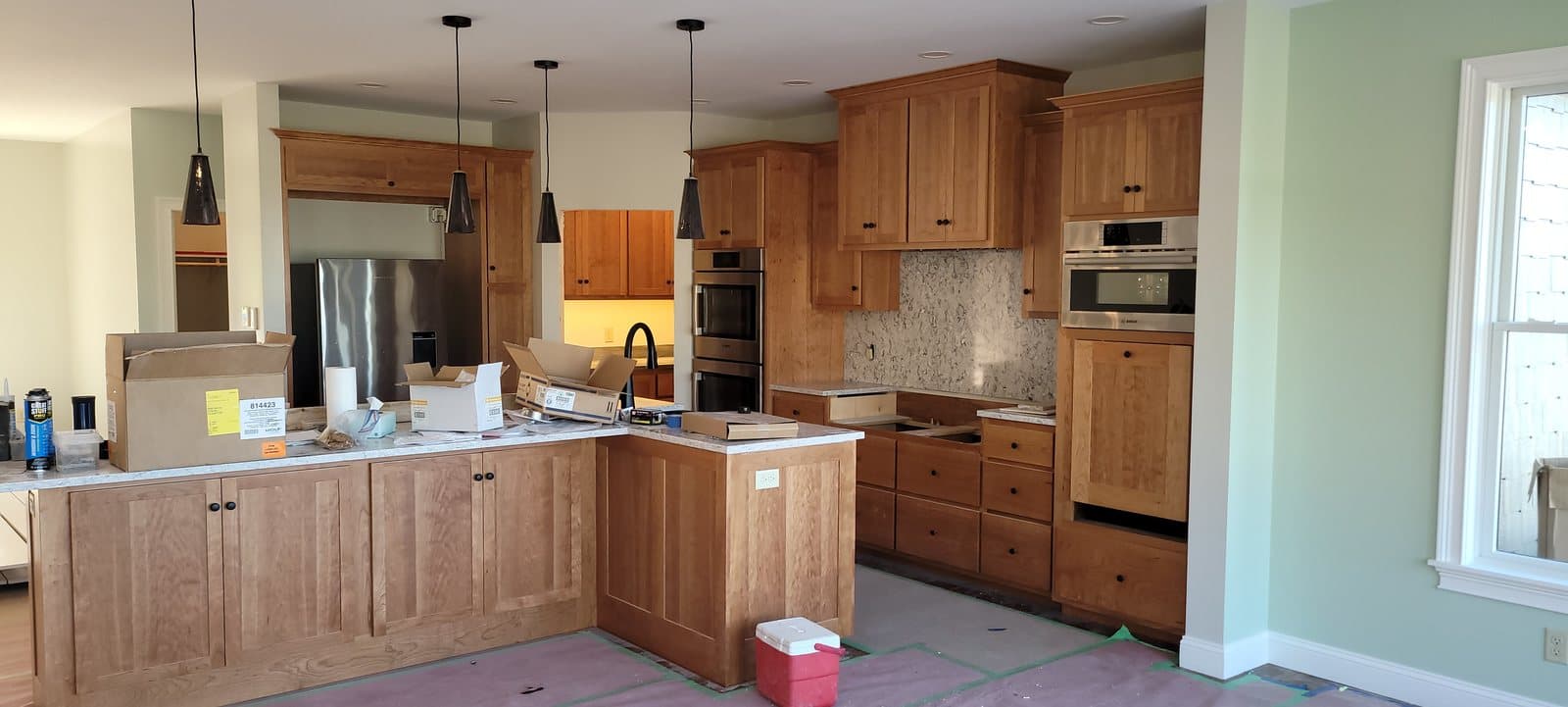 Hickory kitchen with a wide seating island